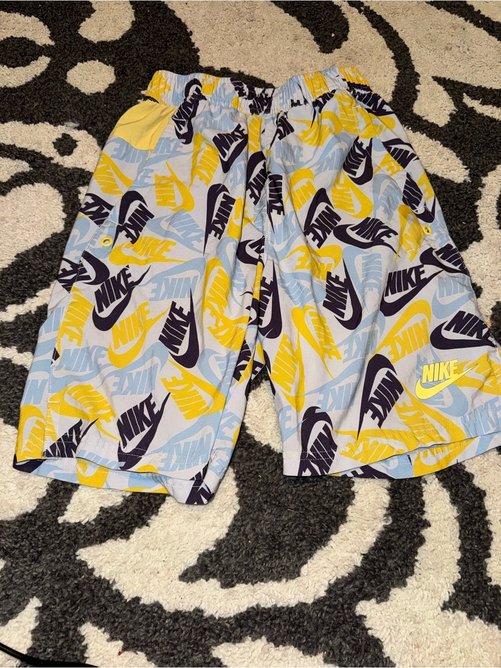 Nike Logo All-Over Print boys swim trunks Light Blue, Yellow, Navy